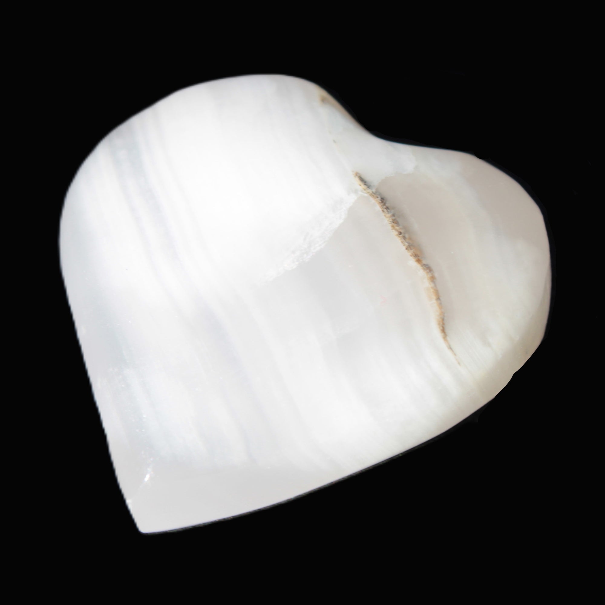 Pink Mangano Calcite heart 38-41mm  42-44g in sunlight - Rocks and Things Store