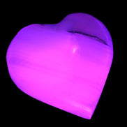 Pink Mangano Calcite heart 38-41mm  42-44g in UV light - Rocks and Things Store