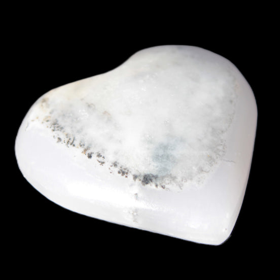 Mangano Calcite hand-carved heart 35-41mm 33-40g in sunlight - Rocks and Things Store