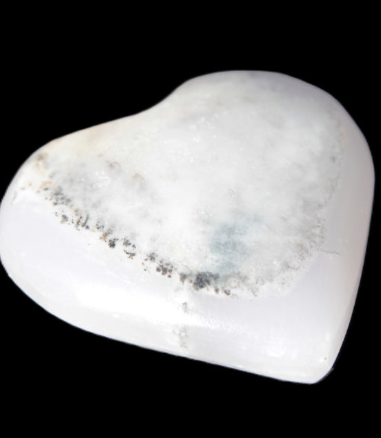 Mangano Calcite hand-carved heart 35-41mm 33-40g in sunlight - Rocks and Things Store