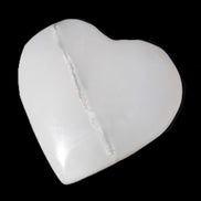 Mangano Calcite hand-carved heart 35-41mm 33-40g in sunlight - Rocks and Things Store