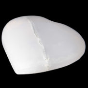 Mangano Calcite hand-carved heart 35-41mm 33-40g in sunlight - Rocks and Things Store