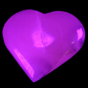 Mangano Calcite hand-carved heart 67*64mm 125g in UV light - Rocks and Things Store
