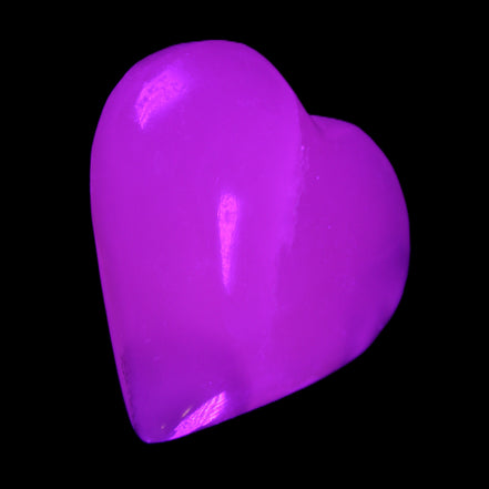 Mangano Calcite hand-carved heart 67*64mm 125g in UV light - Rocks and Things Store