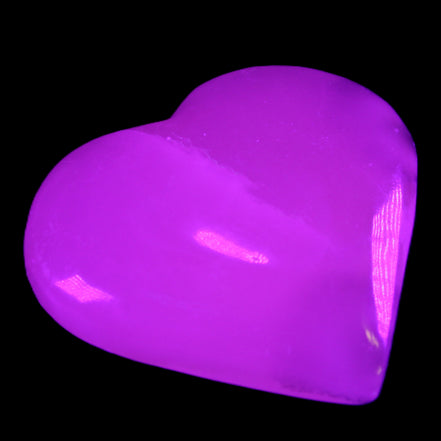 Mangano Calcite hand-carved heart 67*64mm 125g in UV light - Rocks and Things Store