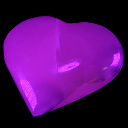 Mangano Calcite hand-carved heart 67*64mm 125g in UV light - Rocks and Things Store