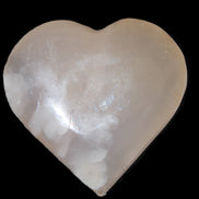 Mangano Calcite hand-carved heart 67*64mm  125g in sunlight - Rocks and Things Store