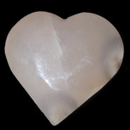 Mangano Calcite hand-carved heart 67*64mm  125g in sunlight - Rocks and Things Store