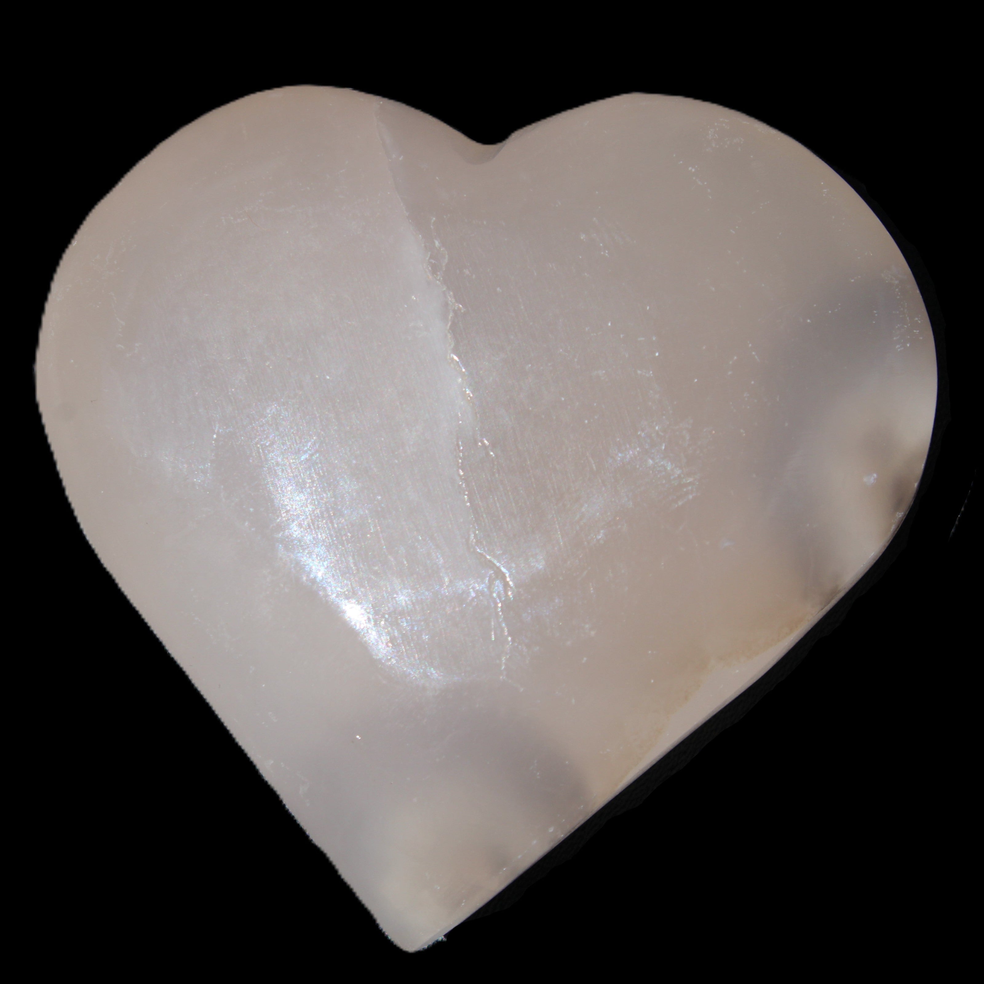 Mangano Calcite hand-carved heart 67*64mm  125g in sunlight - Rocks and Things Store