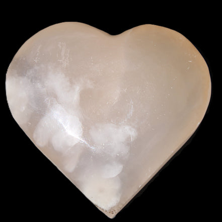 Mangano Calcite hand-carved heart 67*64mm  125g in sunlight - Rocks and Things Store