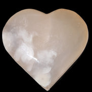 Mangano Calcite hand-carved heart 67*64mm  125g in sunlight - Rocks and Things Store