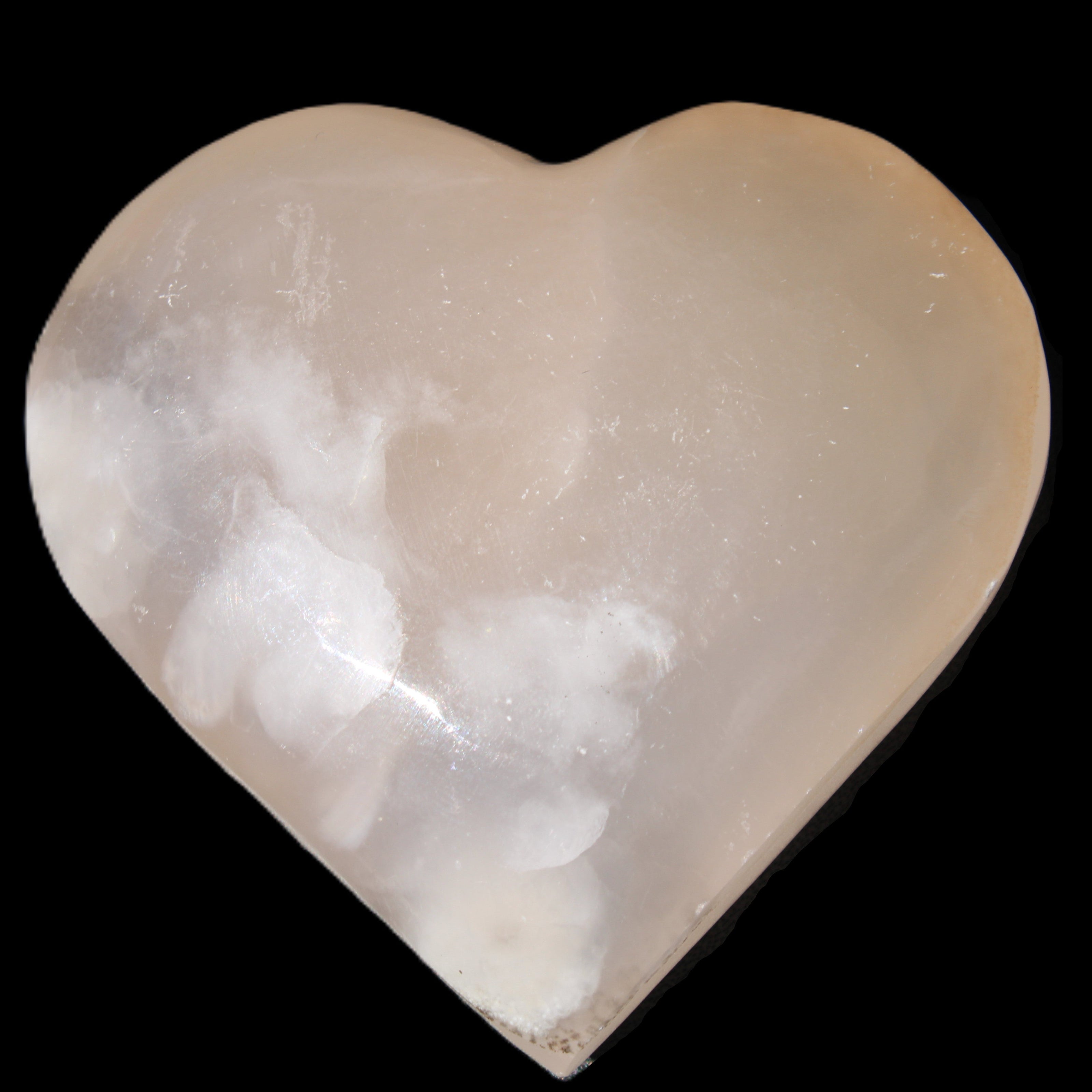 Mangano Calcite hand-carved heart 67*64mm  125g in sunlight - Rocks and Things Store