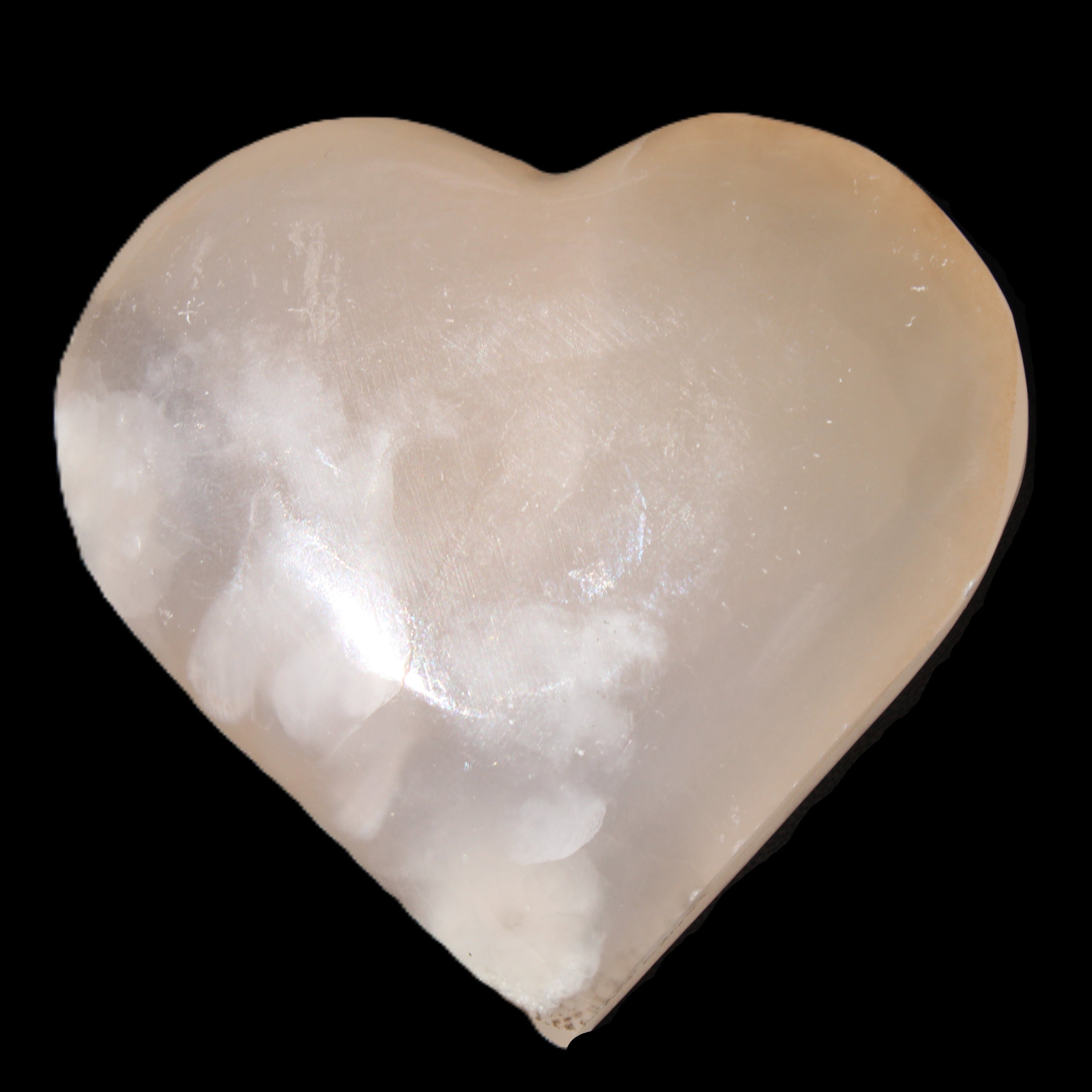 Mangano Calcite hand-carved heart 67*64mm  125g in sunlight - Rocks and Things Store