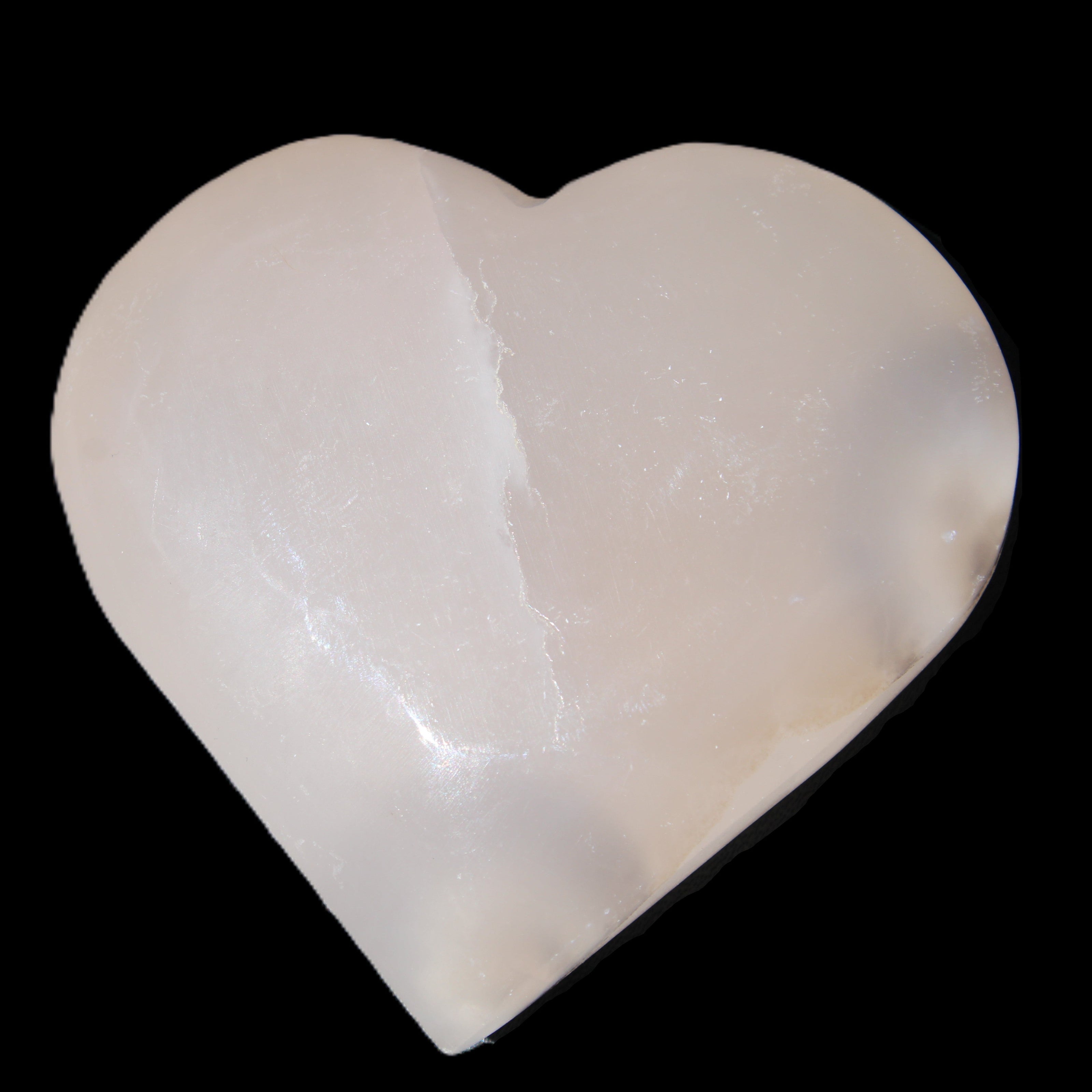 Mangano Calcite hand-carved heart 67*64mm  125g in sunlight - Rocks and Things Store
