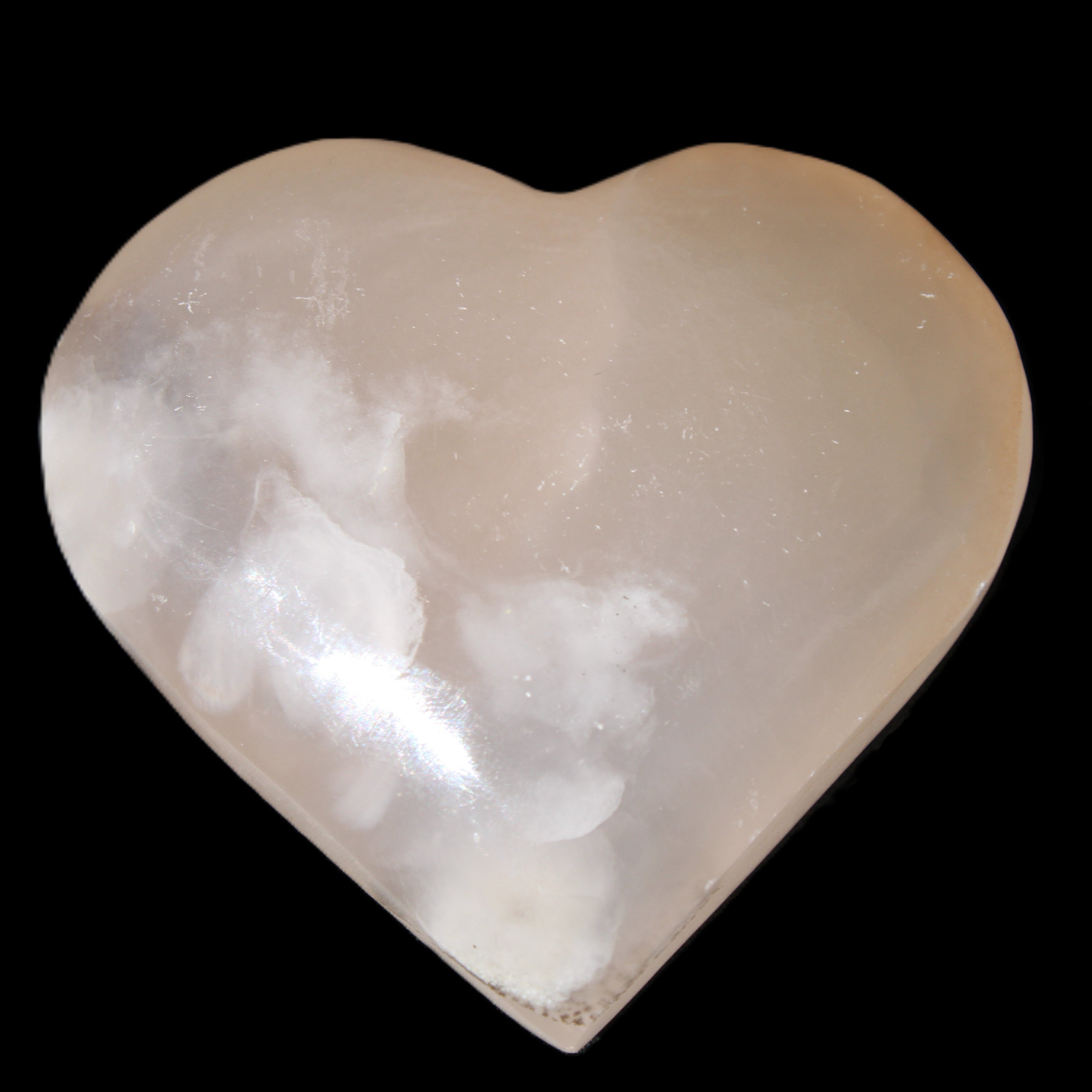Mangano Calcite hand-carved heart 67*64mm  125g in sunlight - Rocks and Things Store