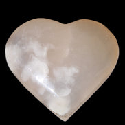 Mangano Calcite hand-carved heart 67*64mm  125g in sunlight - Rocks and Things Store
