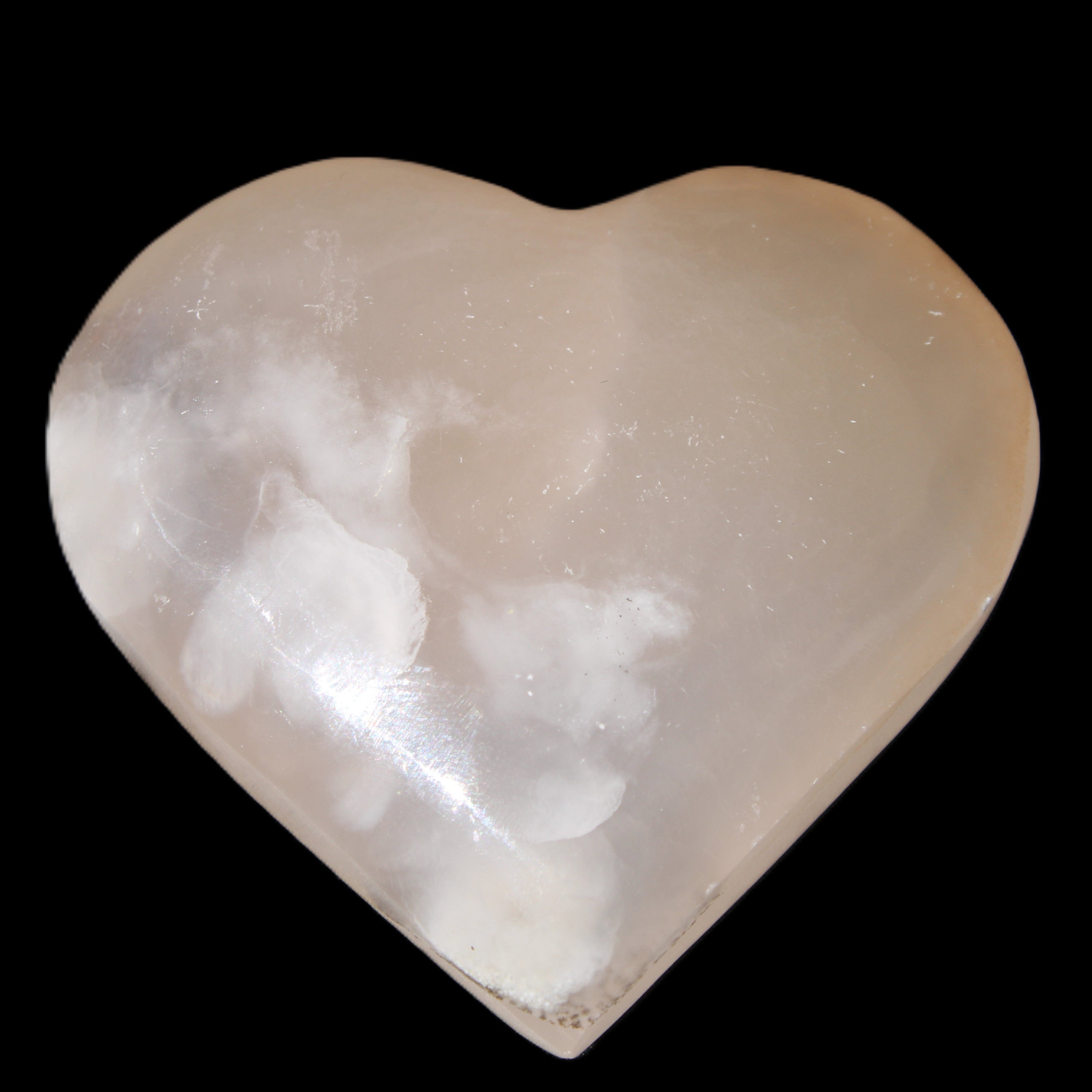 Mangano Calcite hand-carved heart 67*64mm  125g in sunlight - Rocks and Things Store