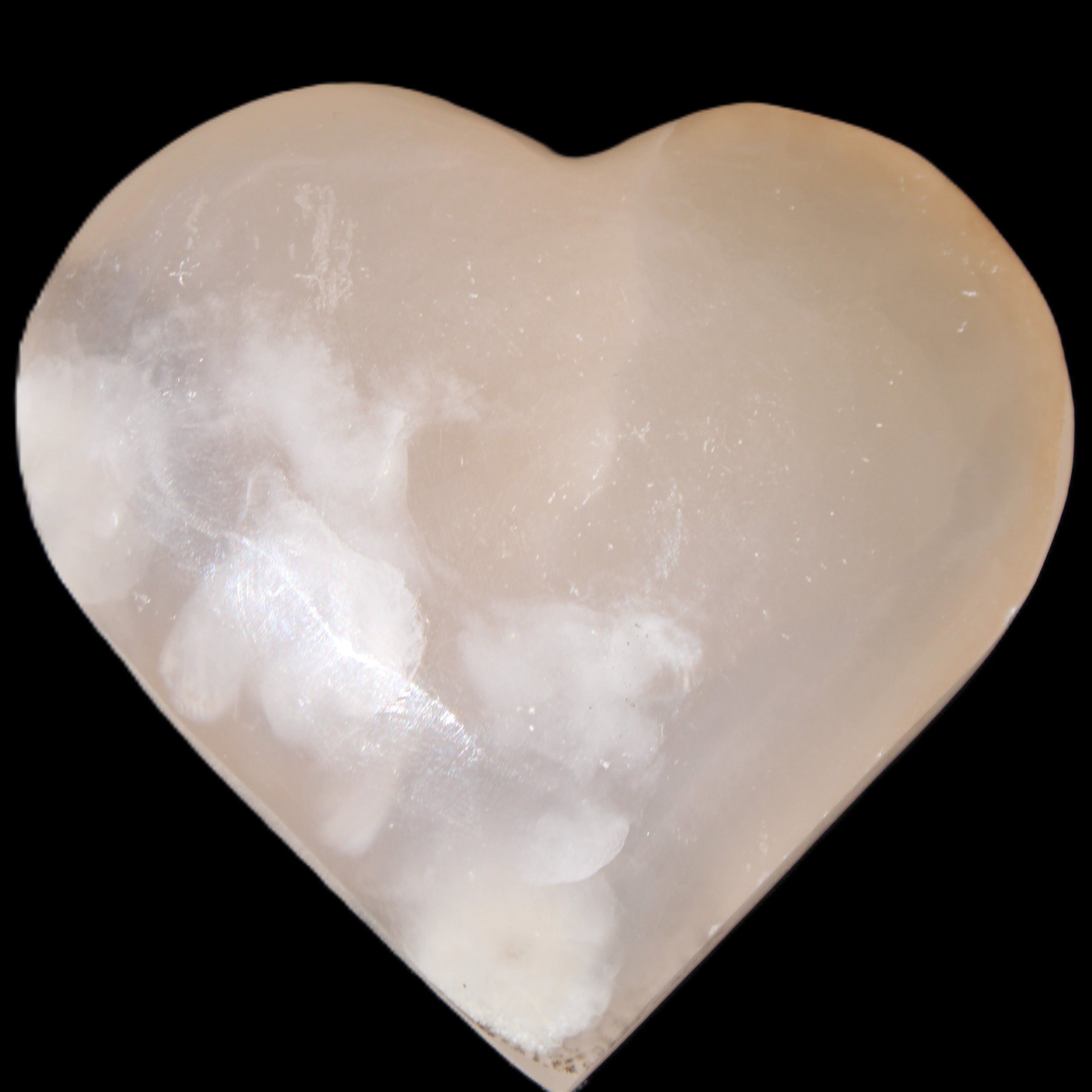 Mangano Calcite hand-carved heart 67*64mm  125g in sunlight - Rocks and Things Store