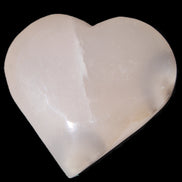 Mangano Calcite hand-carved heart 67*64mm  125g in sunlight - Rocks and Things Store