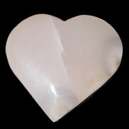 Mangano Calcite hand-carved heart 67*64mm  125g in sunlight - Rocks and Things Store