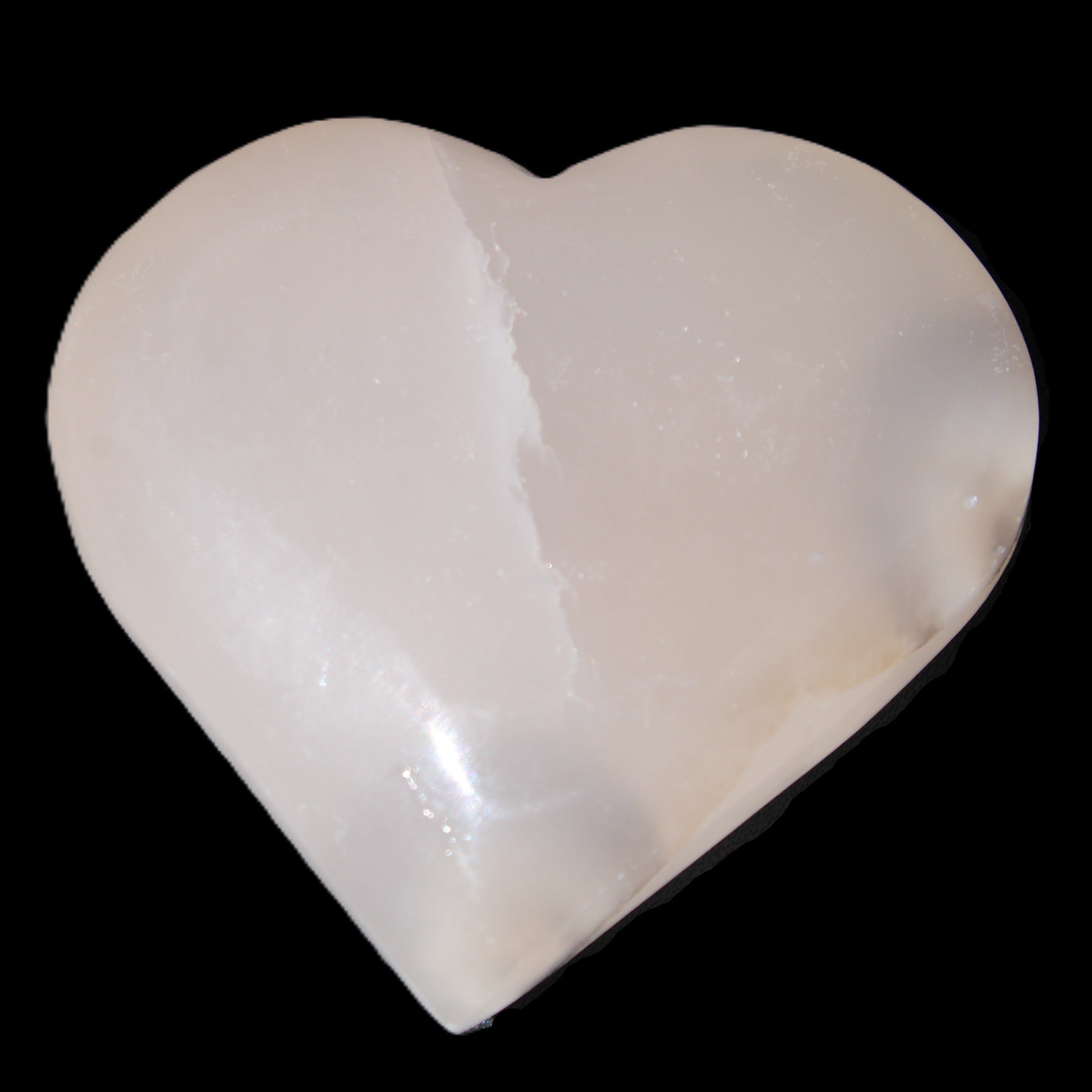 Mangano Calcite hand-carved heart 67*64mm  125g in sunlight - Rocks and Things Store