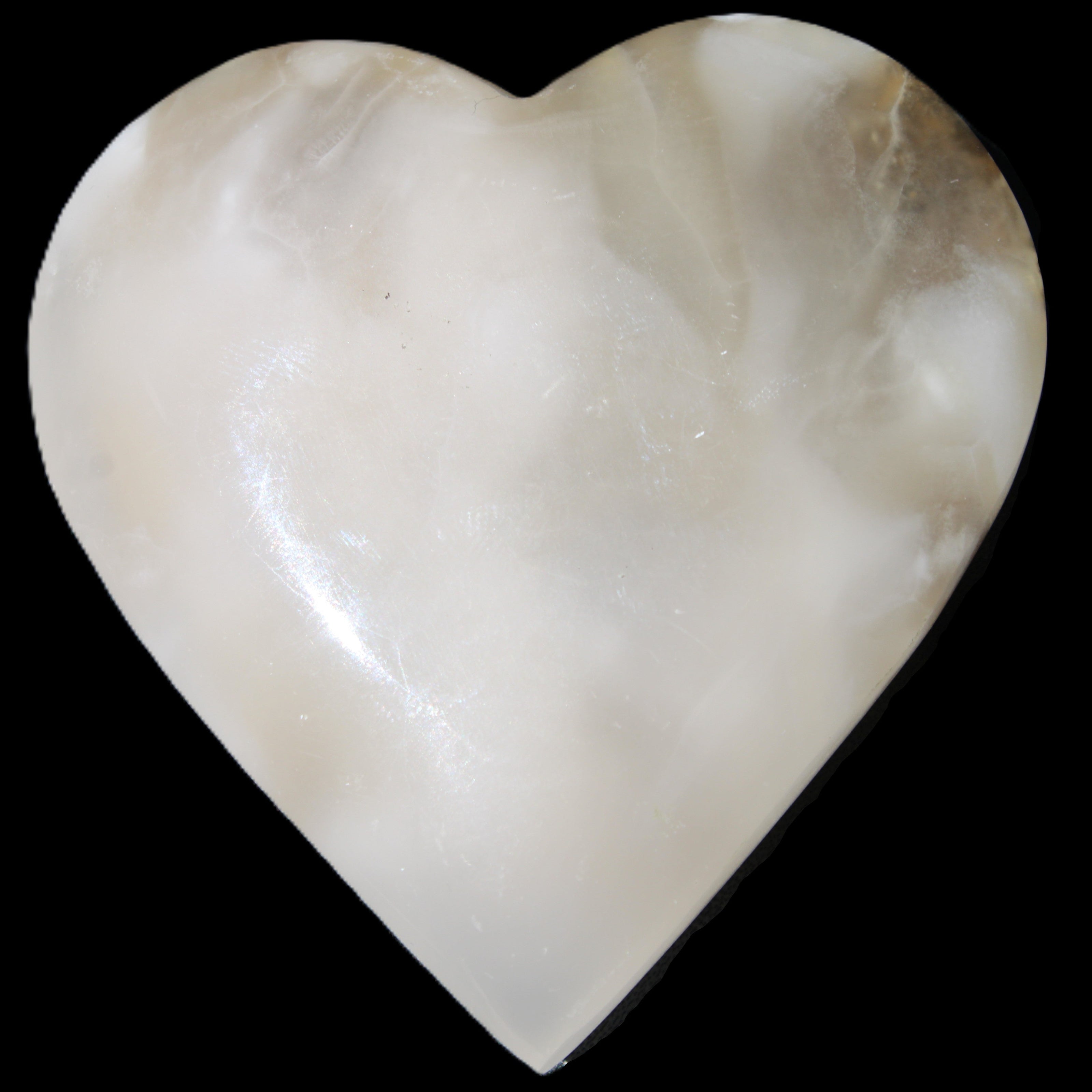 Mangano Calcite hand-carved heart 73*78*20mm 160g in sunlight - Rocks and Things Store