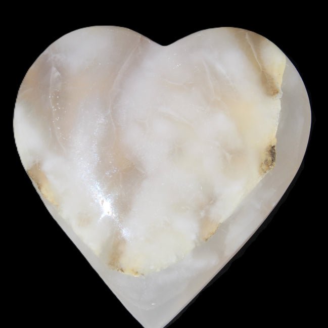 Mangano Calcite hand-carved heart 73*78*20mm 160g in sunlight - Rocks and Things Store