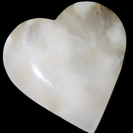 Mangano Calcite hand-carved heart 73*78*20mm 160g in sunlight - Rocks and Things Store