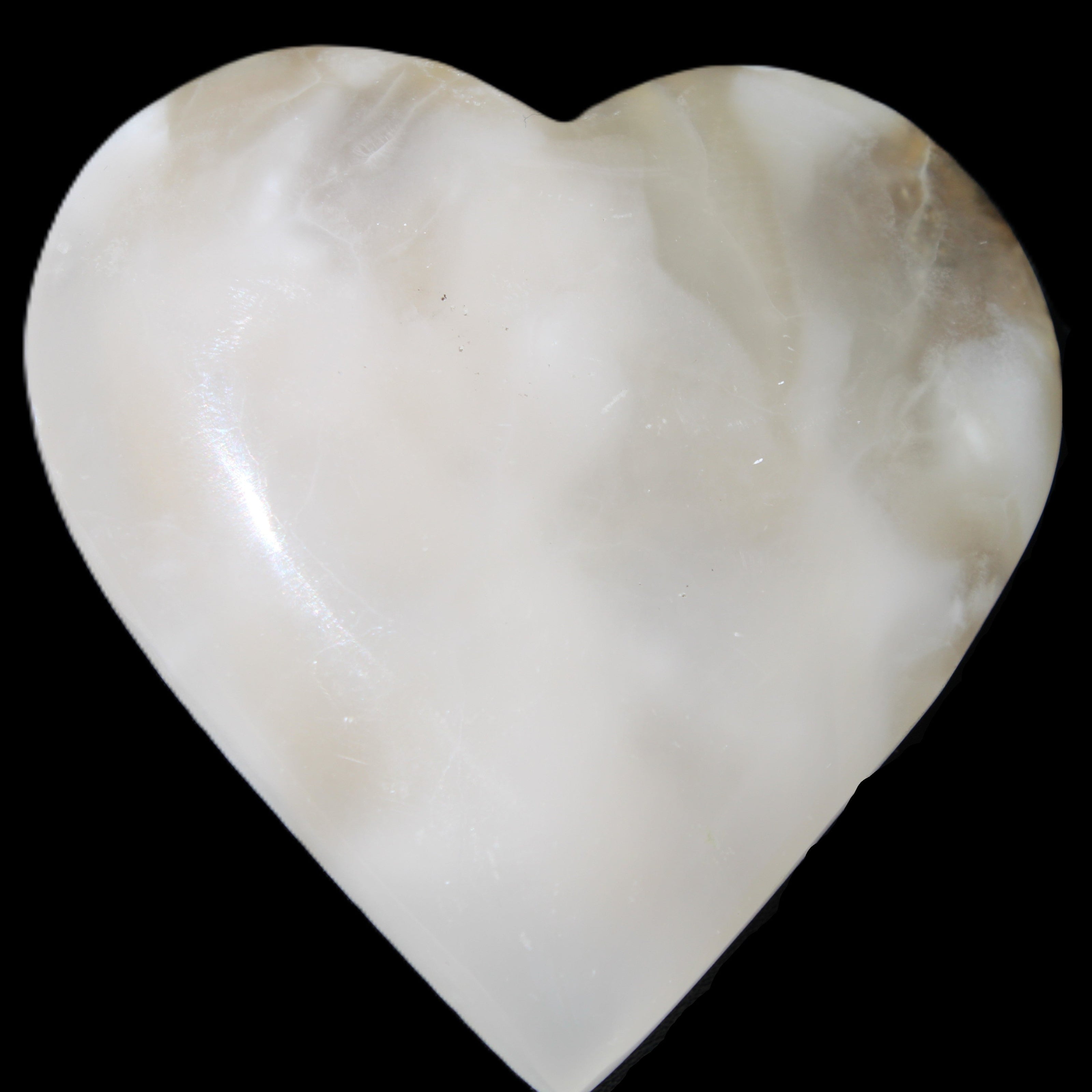 Mangano Calcite hand-carved heart 73*78*20mm 160g in sunlight - Rocks and Things Store