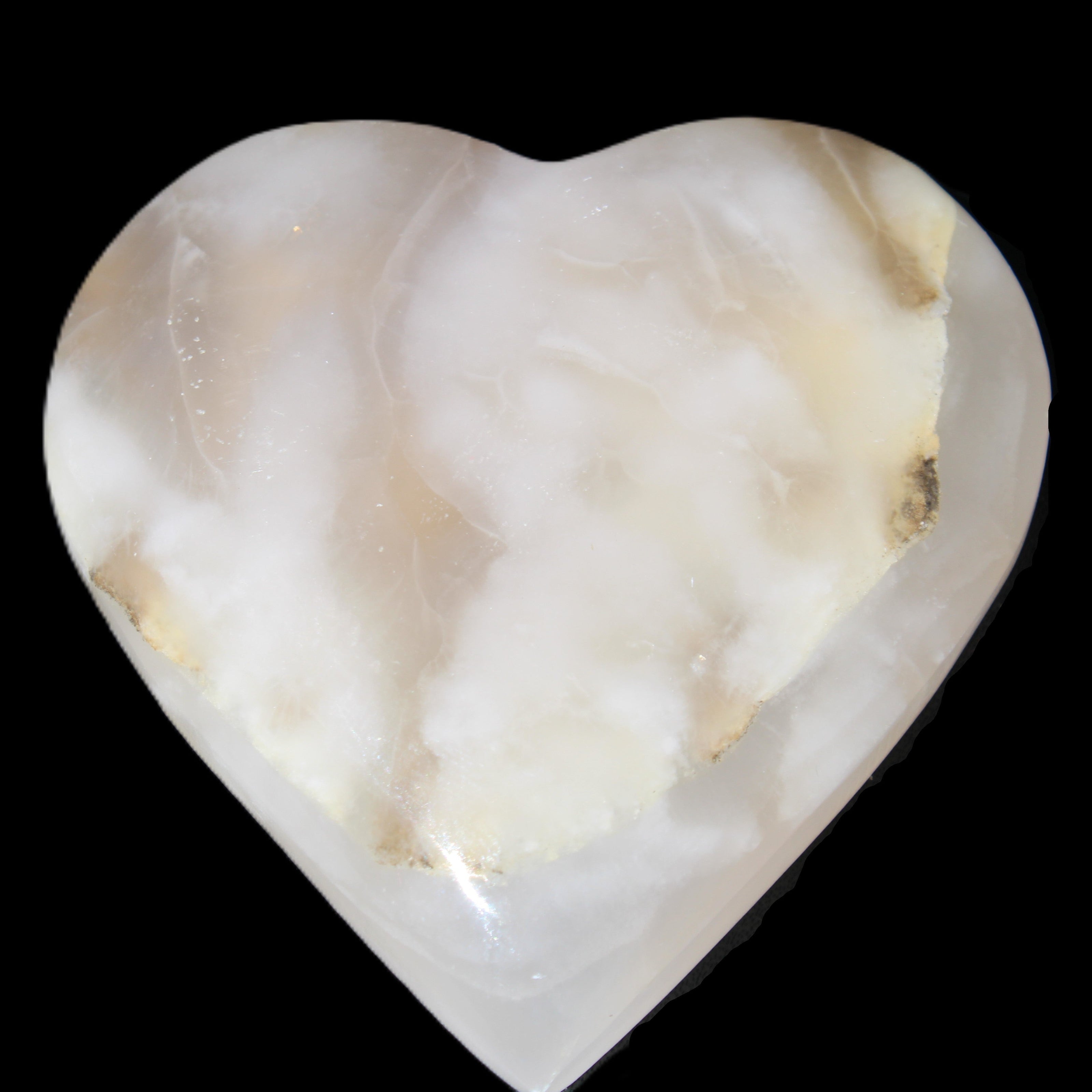 Mangano Calcite hand-carved heart 73*78*20mm 160g in sunlight - Rocks and Things Store