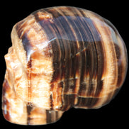 Chocolate Calcite skull 52-53mm 191-204g in sunshine - Rocks and Things Store