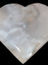 Mangano Calcite hand-carved heart 67-94mm  129-274g in sunlight - Rocks and Things Store