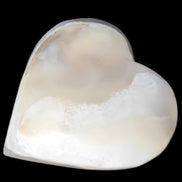 Mangano Calcite hand-carved heart 67mm 120/125g in sunlight - Rocks and Things Store
