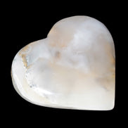Mangano Calcite hand-carved heart 67mm 120/125g in sunlight - Rocks and Things Store