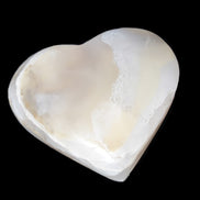 Mangano Calcite hand-carved heart 67mm 120/125g in sunlight - Rocks and Things Store