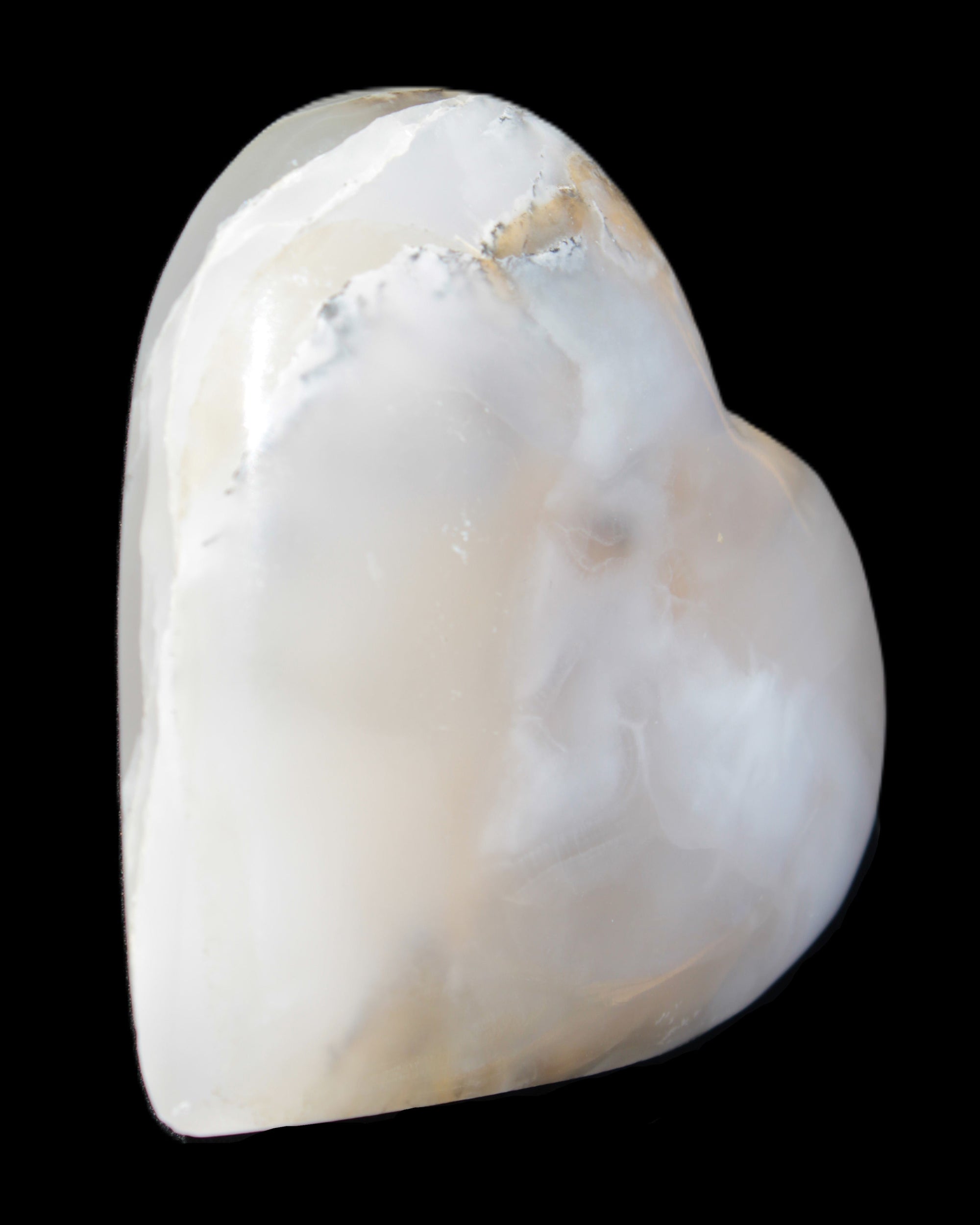 Mangano Calcite hand-carved heart 67mm 120/125g in sunlight - Rocks and Things Store