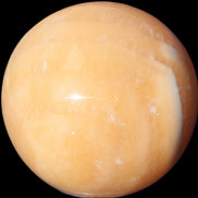 Yellow  Calcite sphere 64/65mm 346-371g  in sunshine - Rocks and Things Store