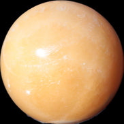 Yellow  Calcite sphere 64/65mm 346-371g  in sunshine - Rocks and Things Store