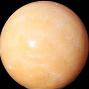 Yellow  Calcite sphere 64/65mm 346-371g  in sunshine - Rocks and Things Store