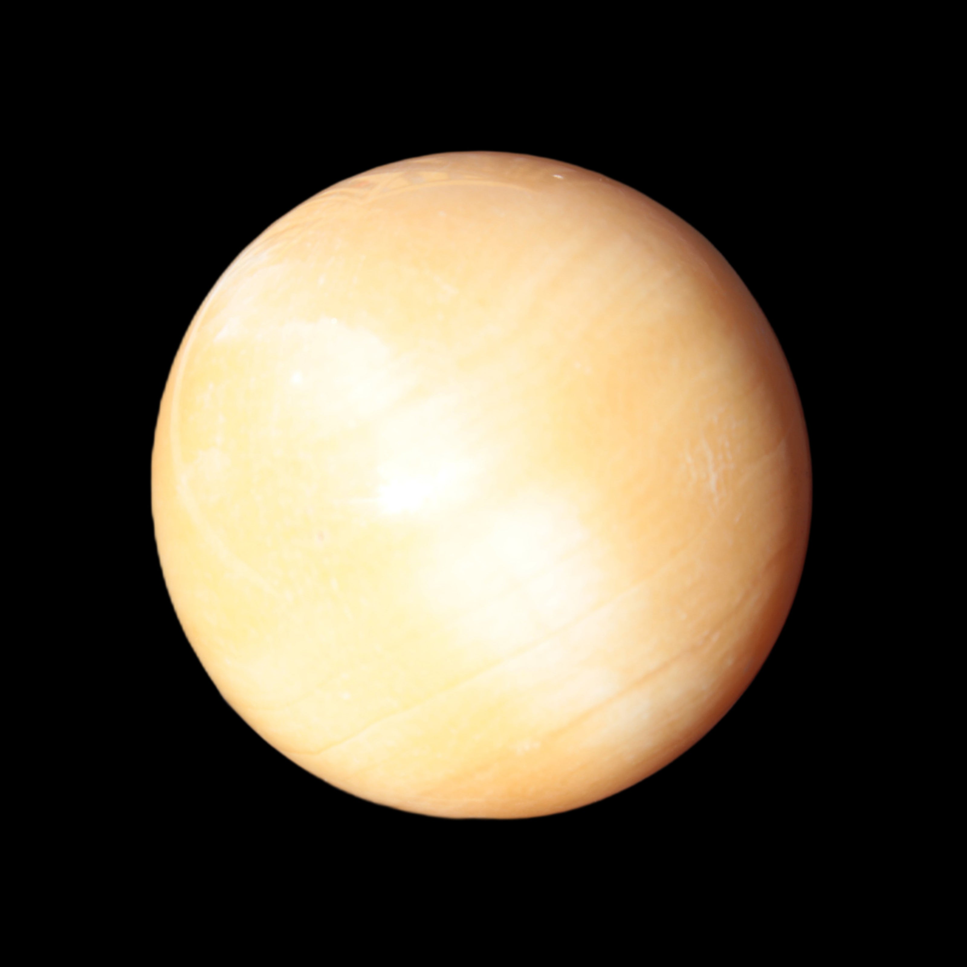 Honey Calcite sphere 53mm 187g in sunlight - Rocks and Things Store