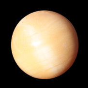 Honey Calcite sphere 53mm 187g in sunlight - Rocks and Things Store