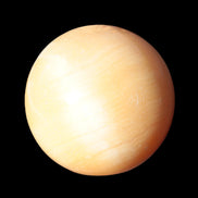 Honey Calcite sphere 53mm 187g in sunlight - Rocks and Things Store