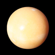 Honey Calcite sphere 53mm 187g in sunlight - Rocks and Things Store