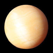 Honey Calcite sphere 53mm 187g in sunlight - Rocks and Things Store