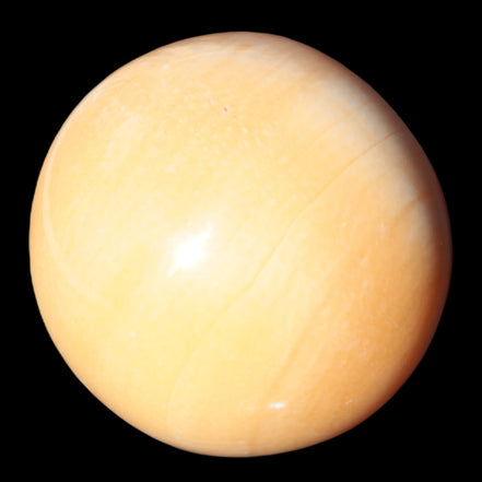 Honey Calcite sphere 53mm 187g in UV light - Rocks and Things Store