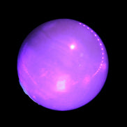 Honey Calcite sphere 53mm 187g in UV light - Rocks and Things Store