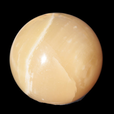 Topaz Honey Calcite sphere 63mm 341g in sunlight - Rocks and Things Store