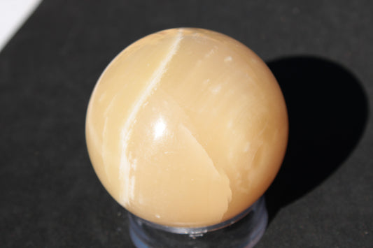 Topaz Honey Calcite sphere 63mm 341g Rocks and Things