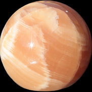 Honey Calcite sphere 48mm 175g in sunshine - Rocks and Things Store