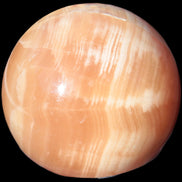 Honey Calcite sphere 48mm 175g in sunshine - Rocks and Things Store